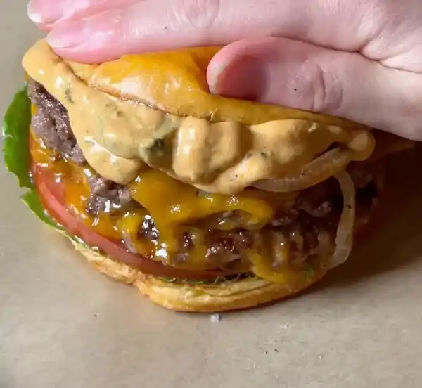 Homemade Beef Burger with Crispy Fries & Signature Sauce